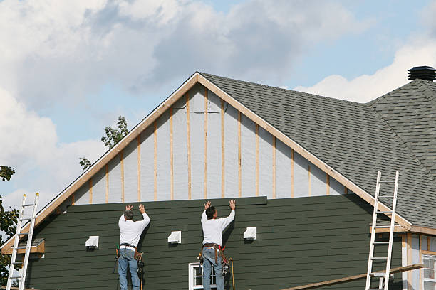 Professional Emergency Siding Repair technician working in Thompson's Station, TN